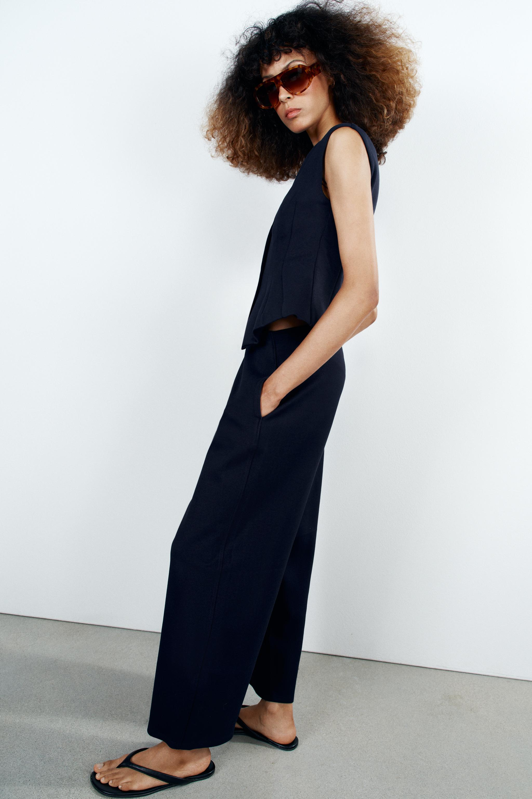 INTERLOCK BUTTON VEST